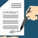 image of two hands signing a contract